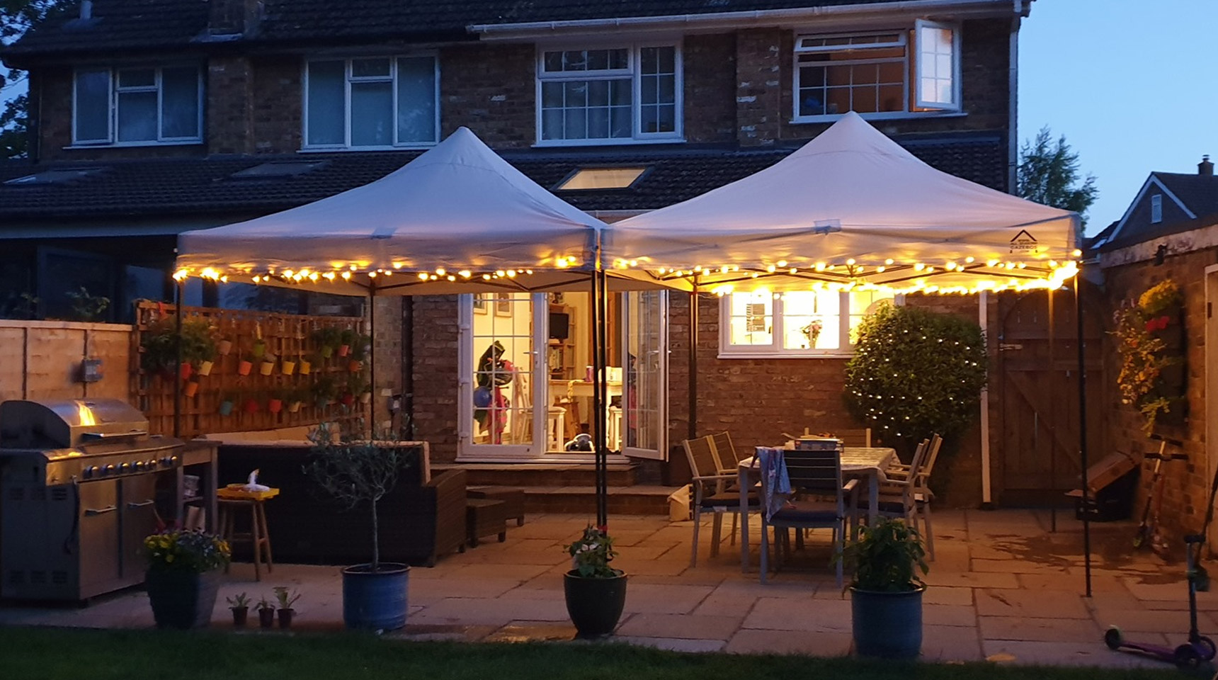 Connected 3x3m Popup Gazebos.